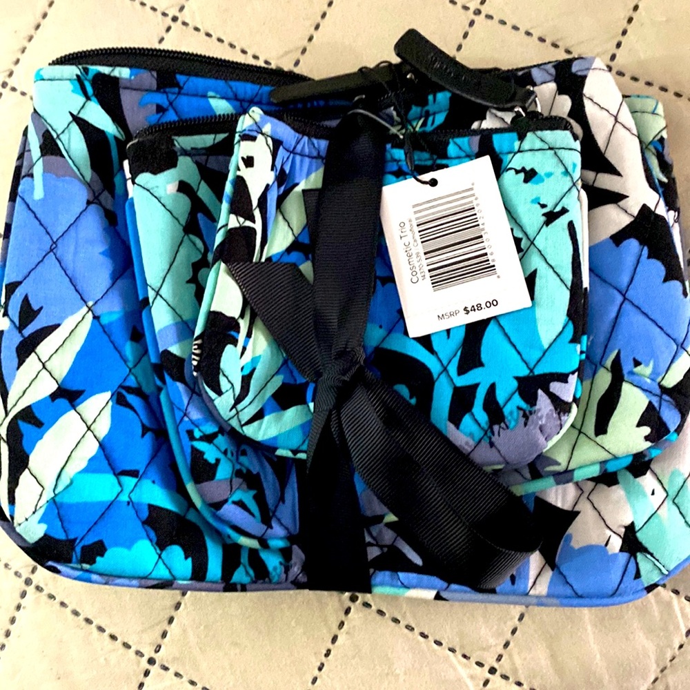 3 piece NWT cosmetic trio in Camofloral design. $15